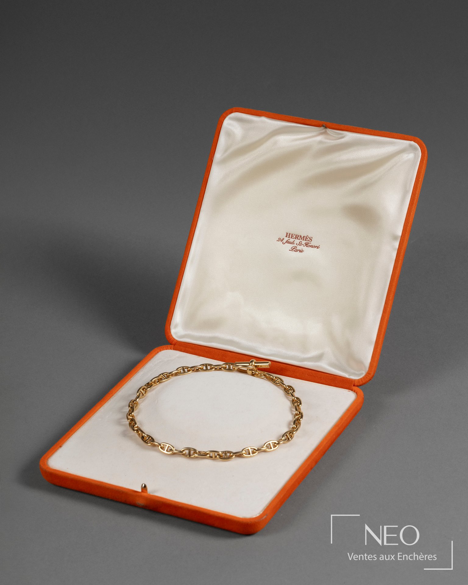 Collier Hermès en or jaune dans son écrin orange signé