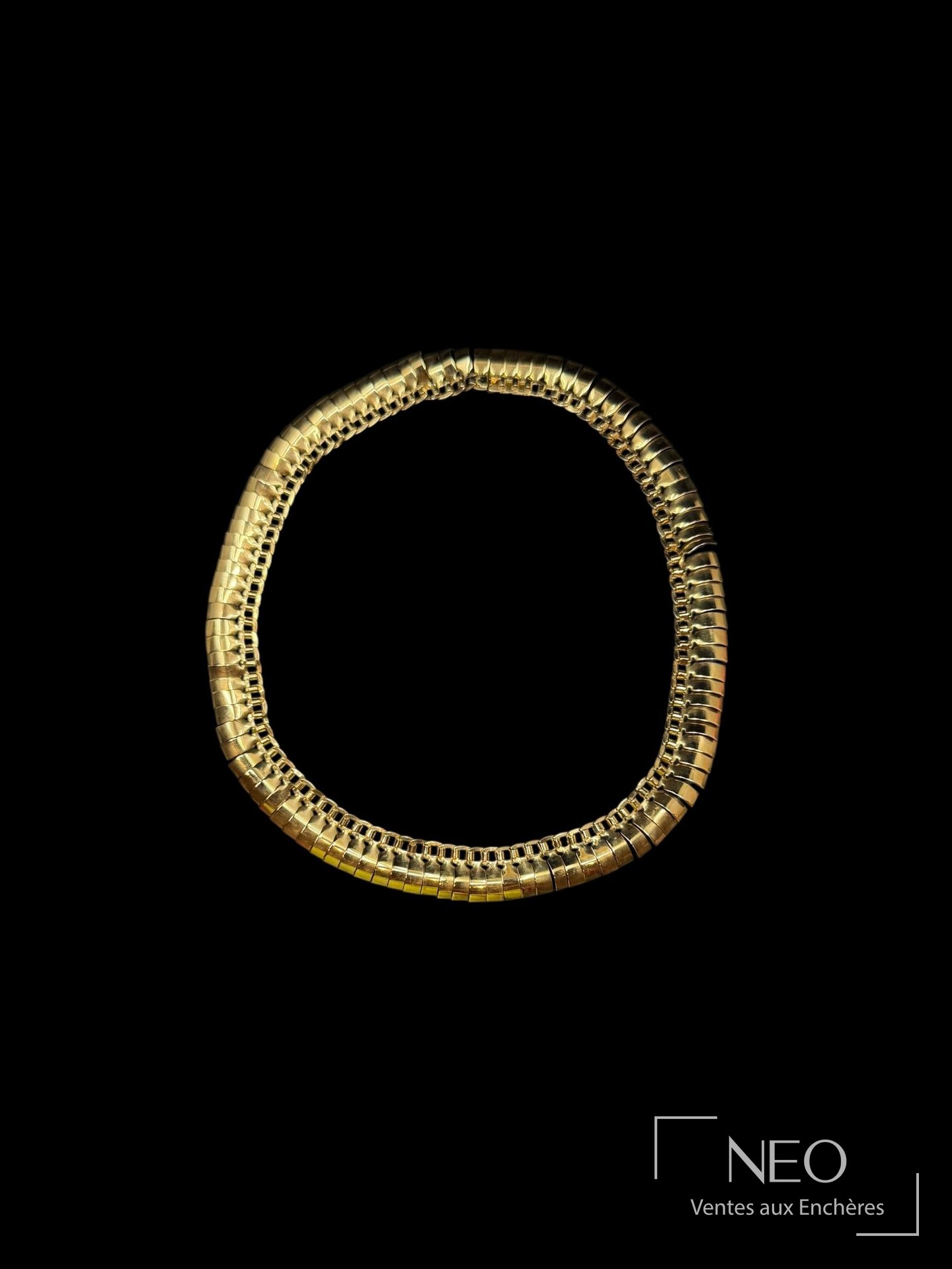 Collier ras de cou en or jaune 18 carats, maille articulée