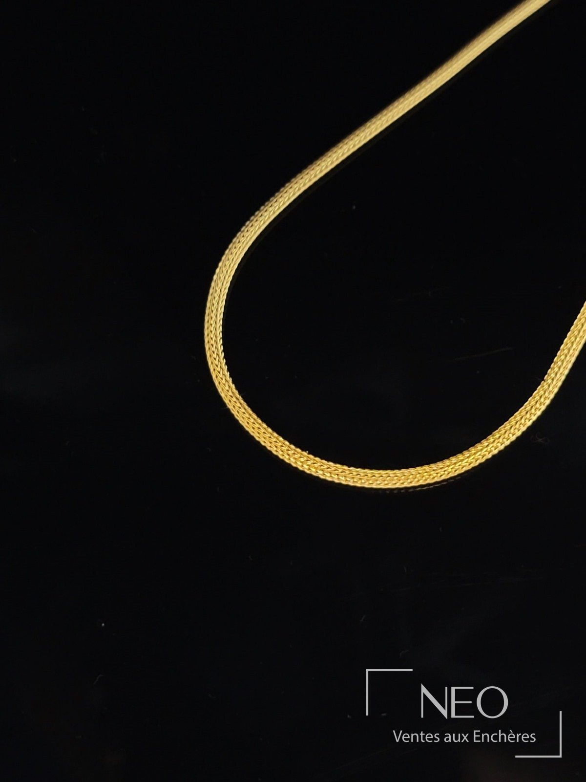 Collier ras de cou en or jaune 18 carats à maille palmier