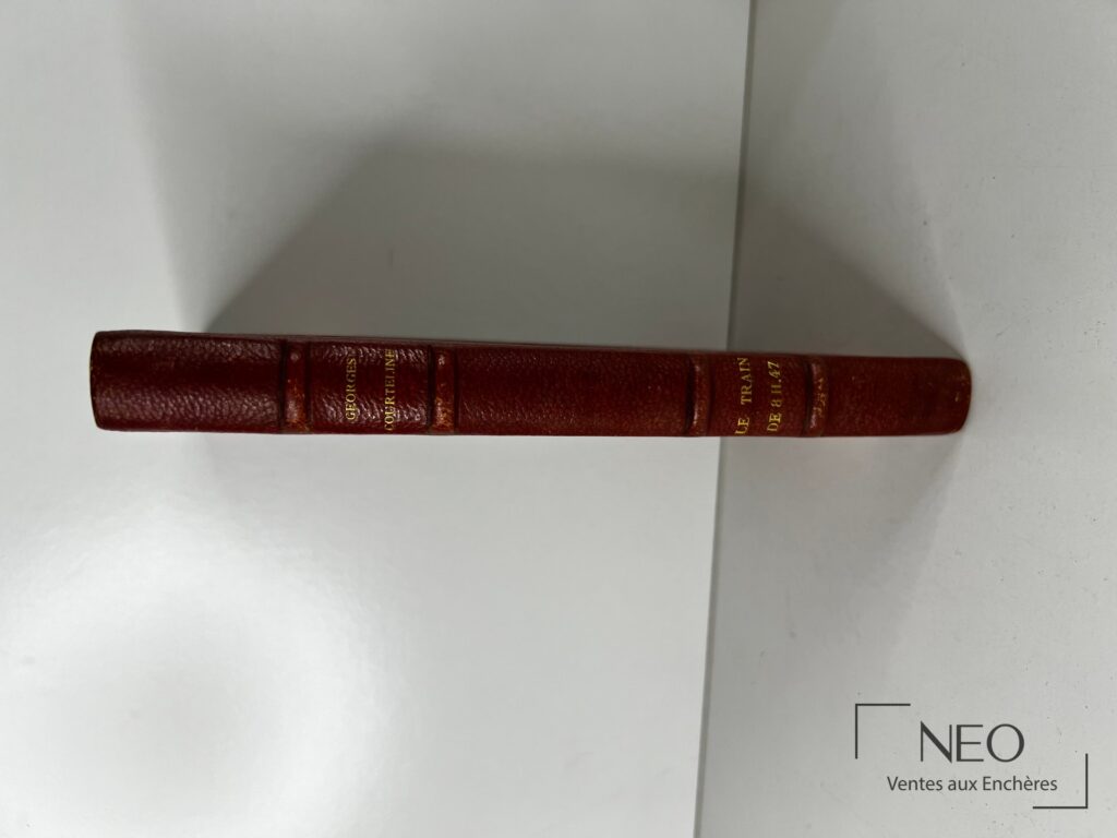 Dos en demi chagrin rouge à nerfs avec titre doré