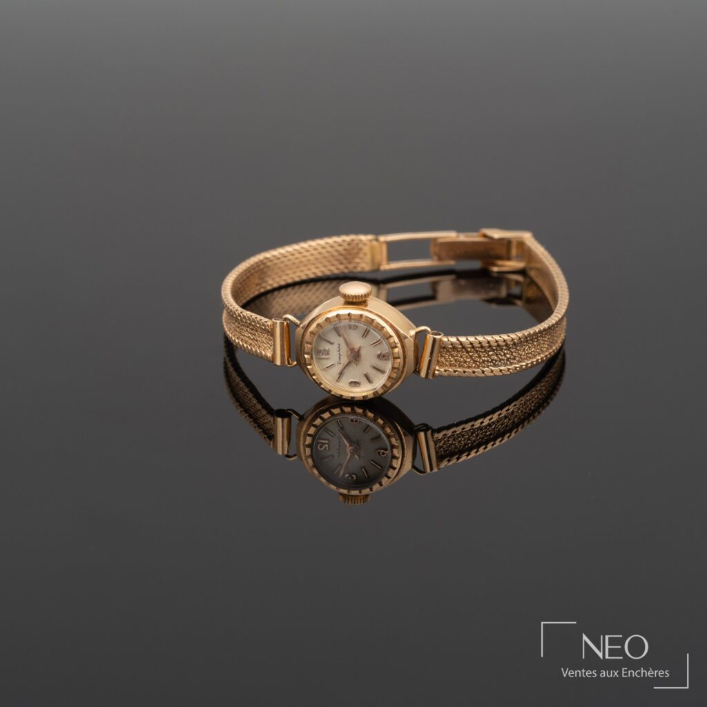 Montre bracelet Dauphine en or jaune