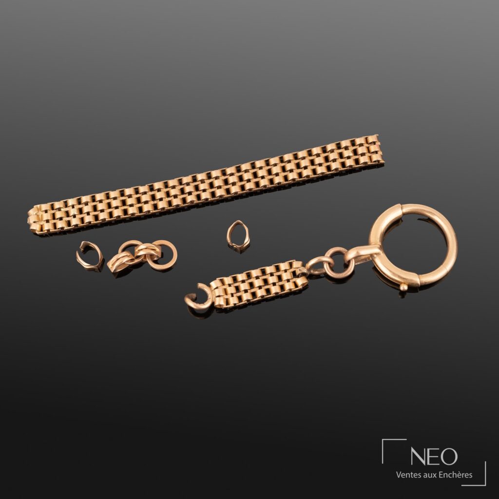 Lot de fragments de chaînes de montre en or rose avec fermoir