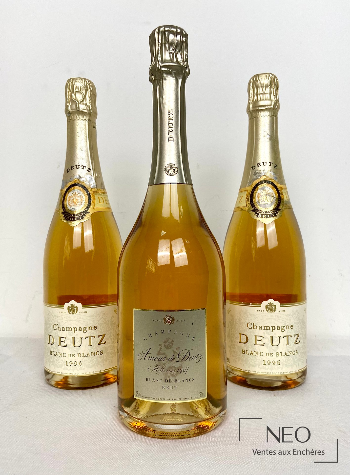 Trois bouteilles de champagne Deutz