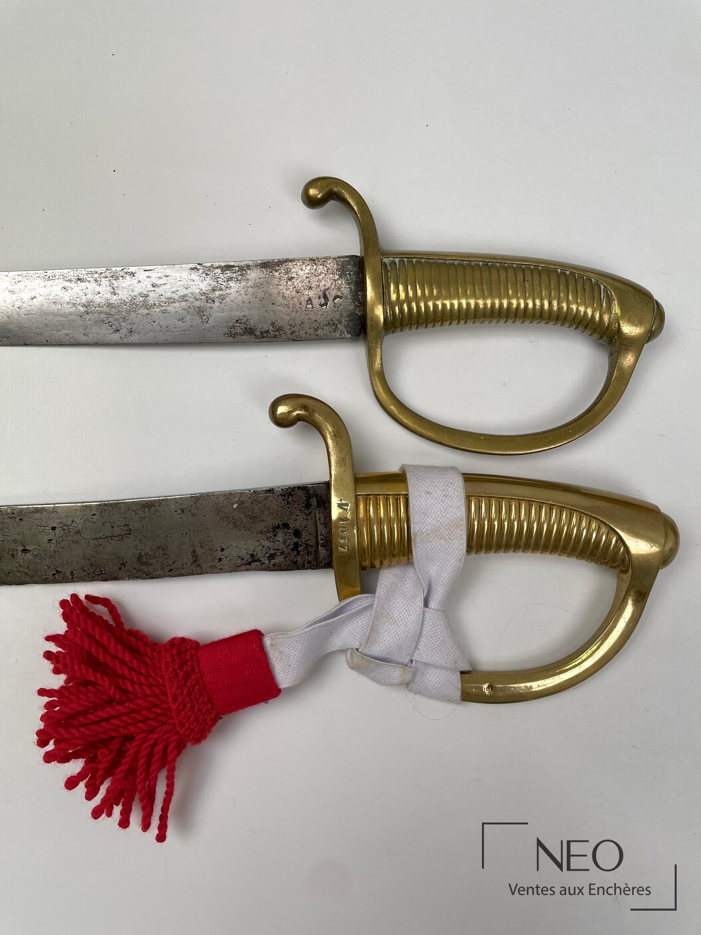 Deux sabres d’infanterie Briquets, montures en bronze, milieu du XIXe siècle