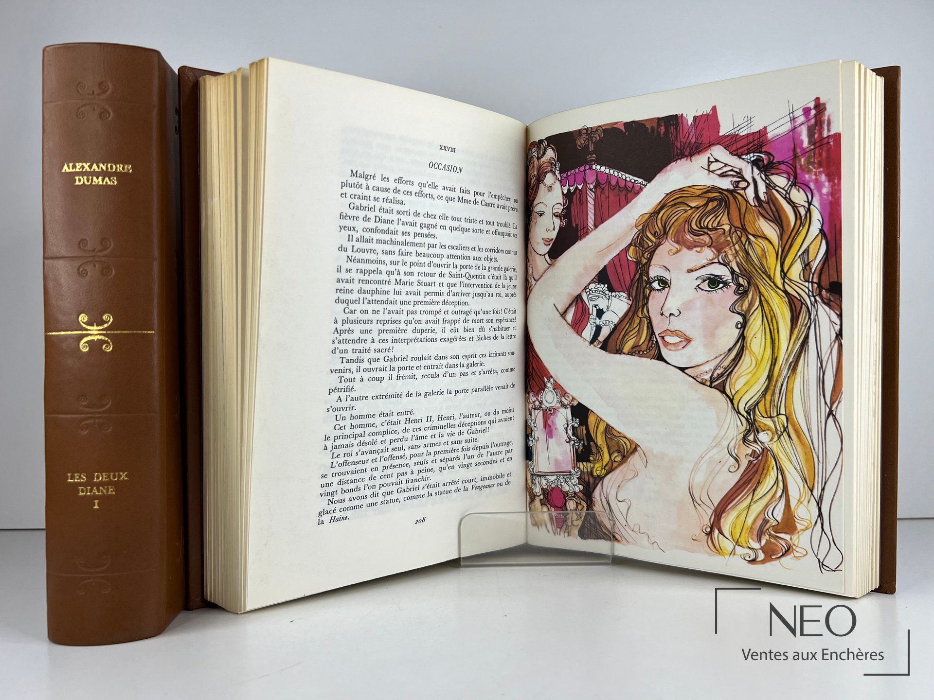 Livre ouvert montrant une page illustrée et la tranche cuir doré des Deux Diane