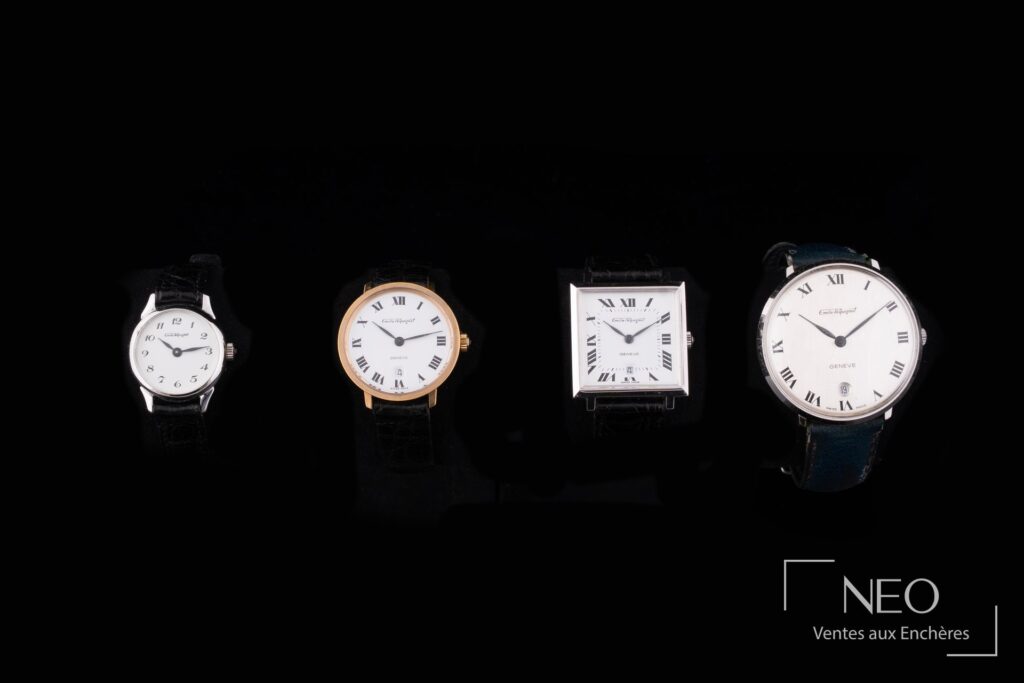 Lot de quatre montres de dame Emile Pequinet présentées de face sur fond noir
