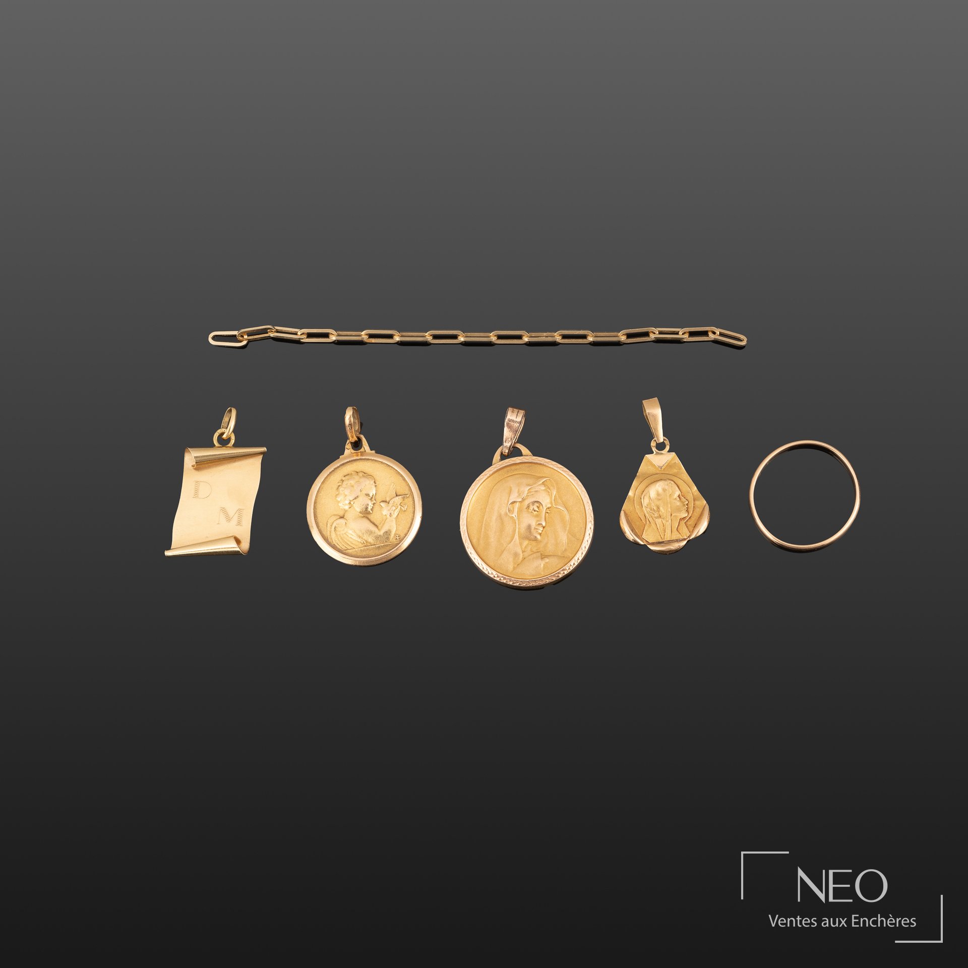 Ensemble de bijoux en or 18K comprenant alliance
