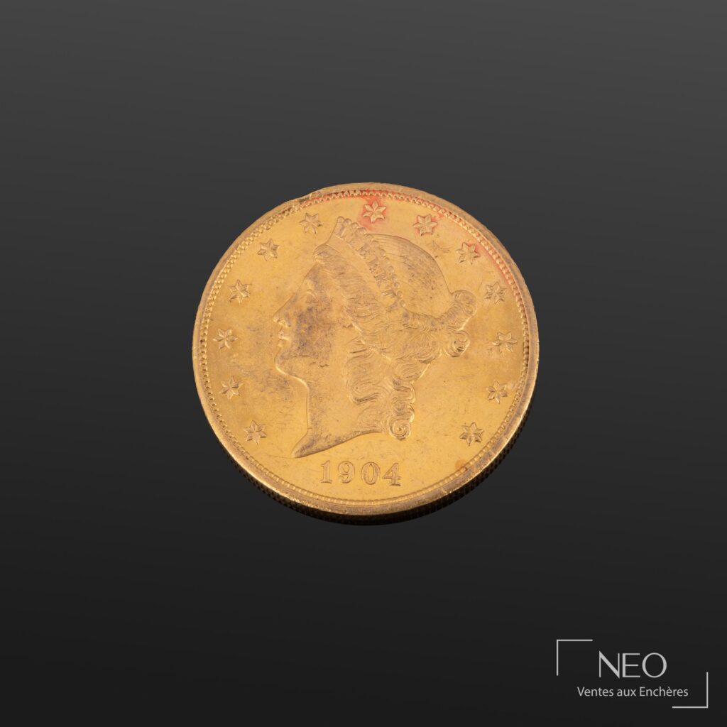 Avers d’une pièce américaine de 20 dollars en or datée 1904