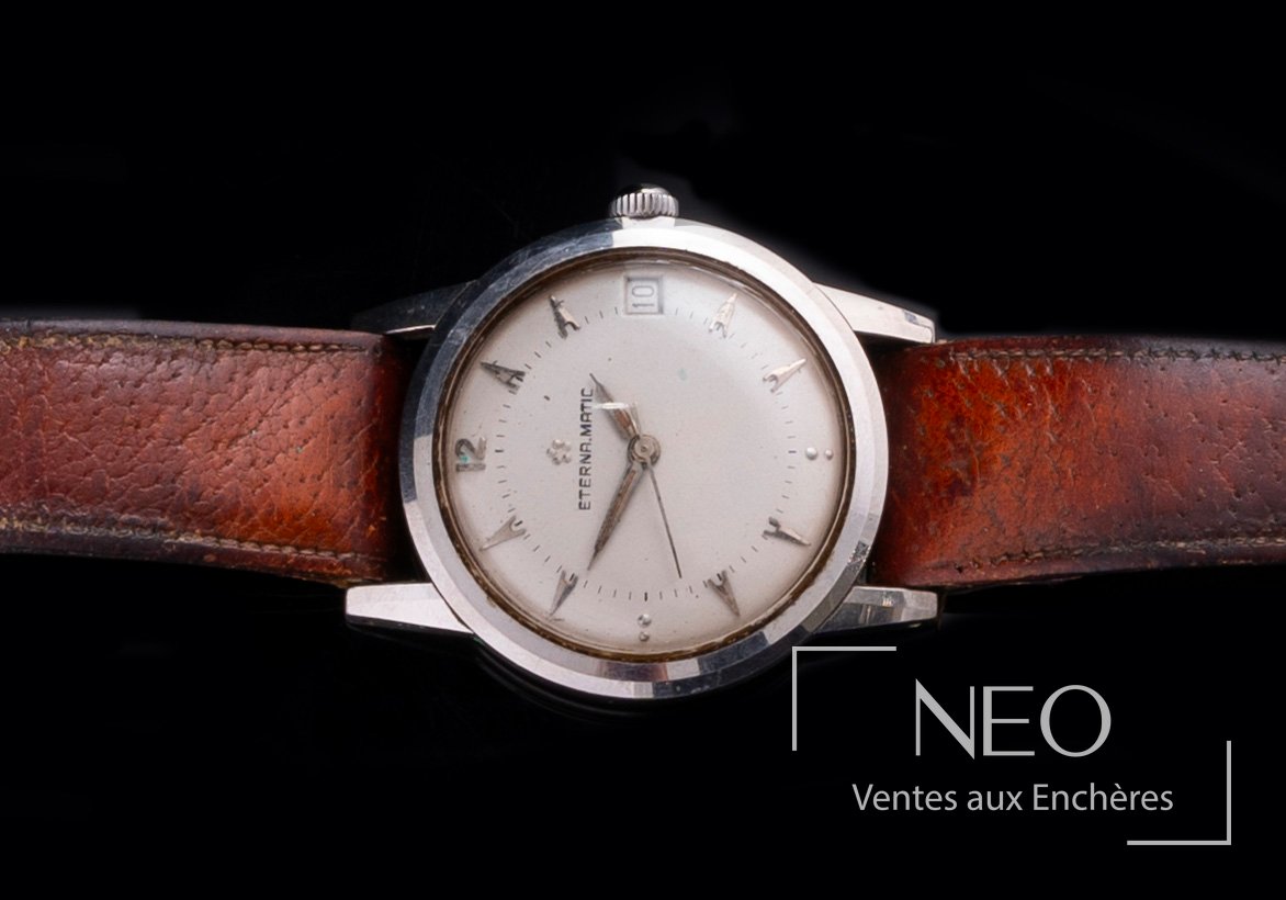 Montre Eterna Matic en acier avec cadran argenté et bracelet en cuir marron