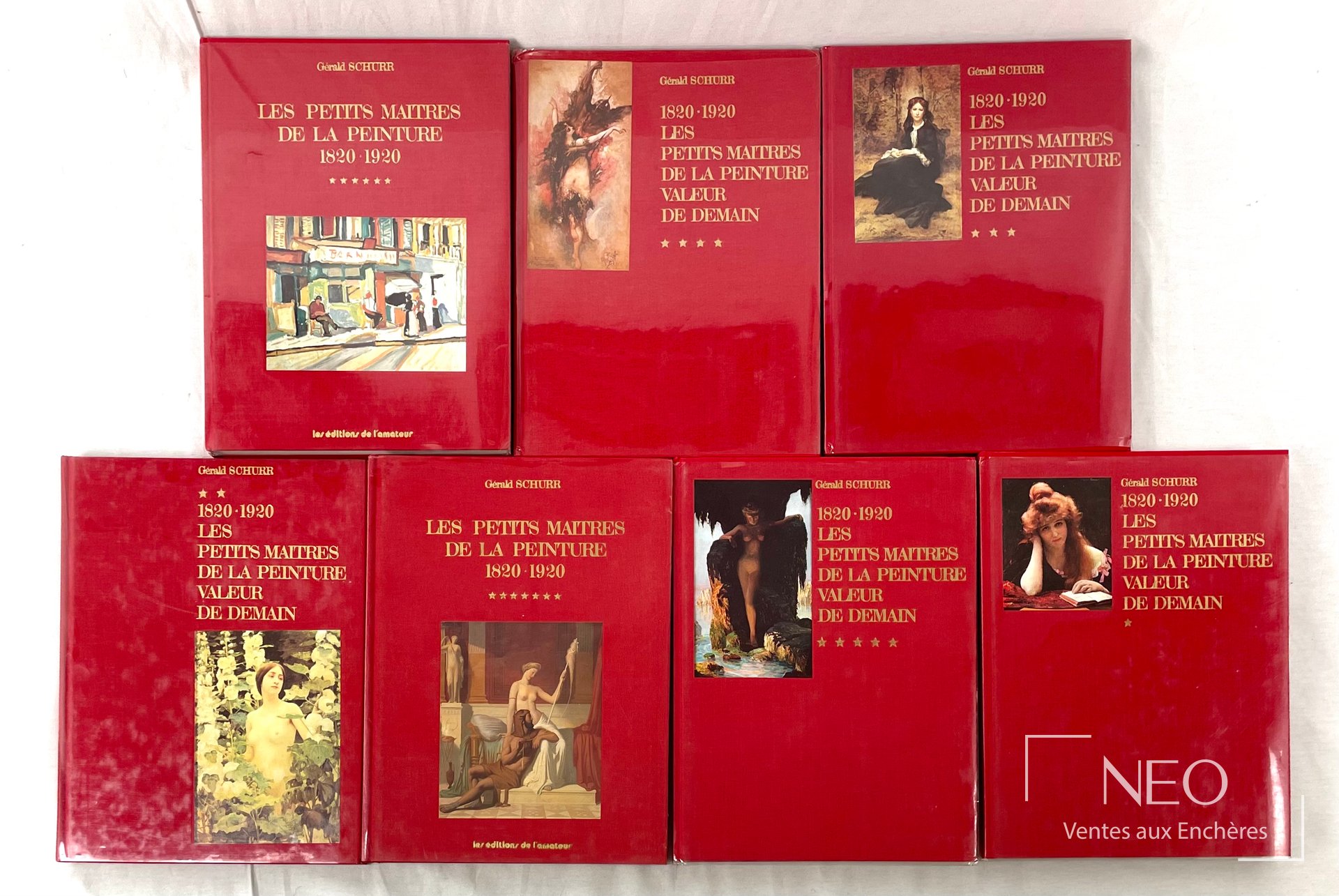 Sept volumes rouges de Gérald Schurr alignés