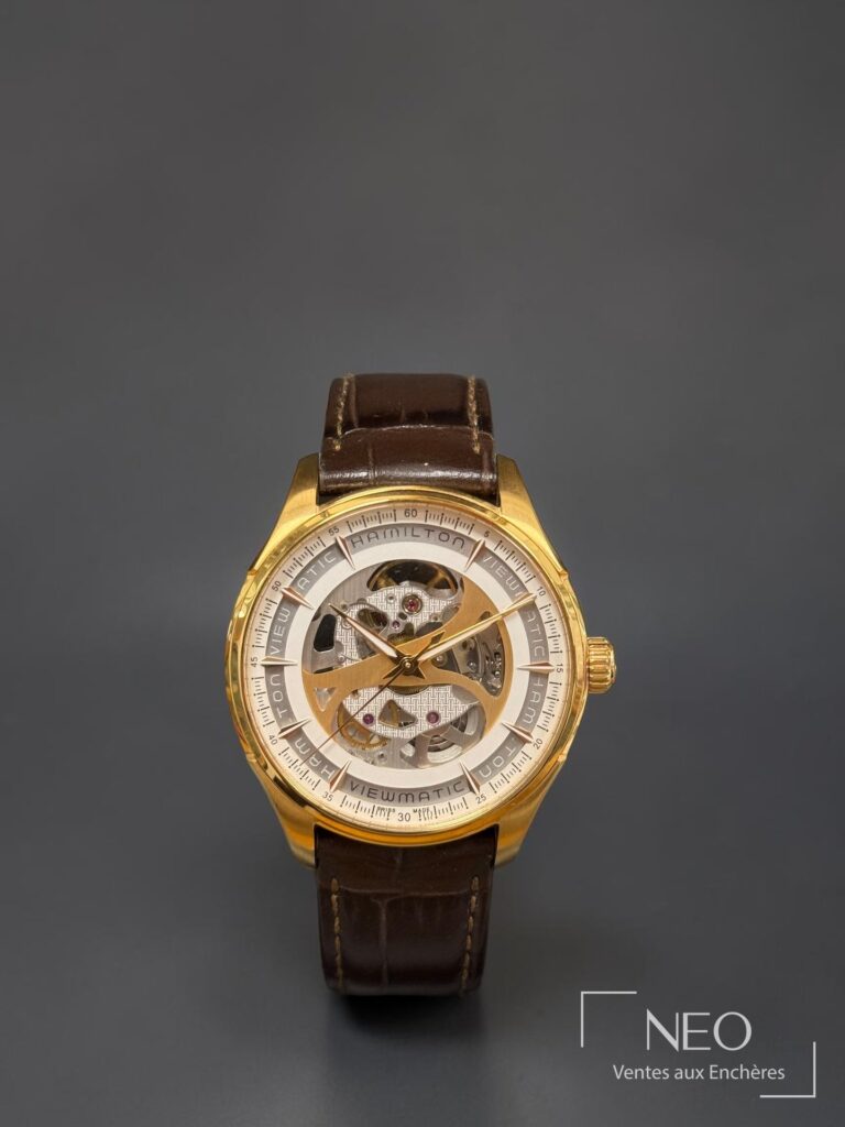 Montre Hamilton Viewmatic squelette avec boîtier doré et bracelet cuir brun