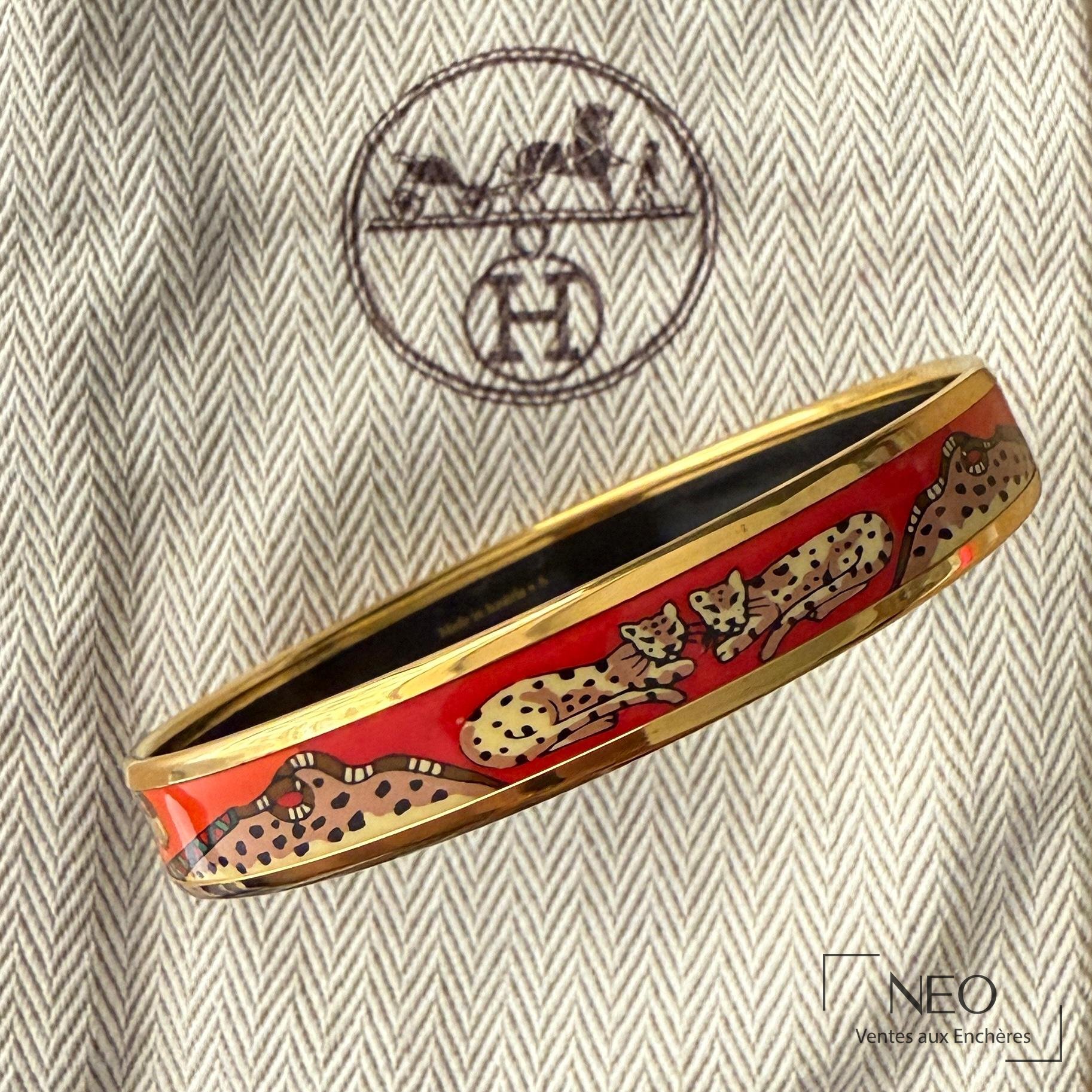 Bracelet jonc Hermès en métal doré