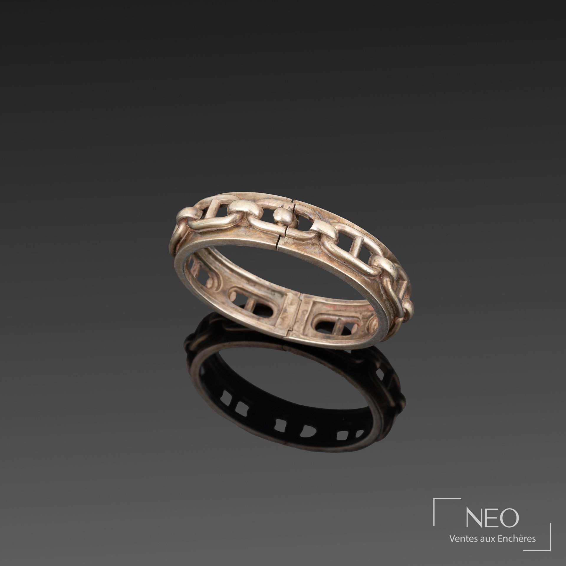 Bracelet rigide ouvrant Hermès en argent