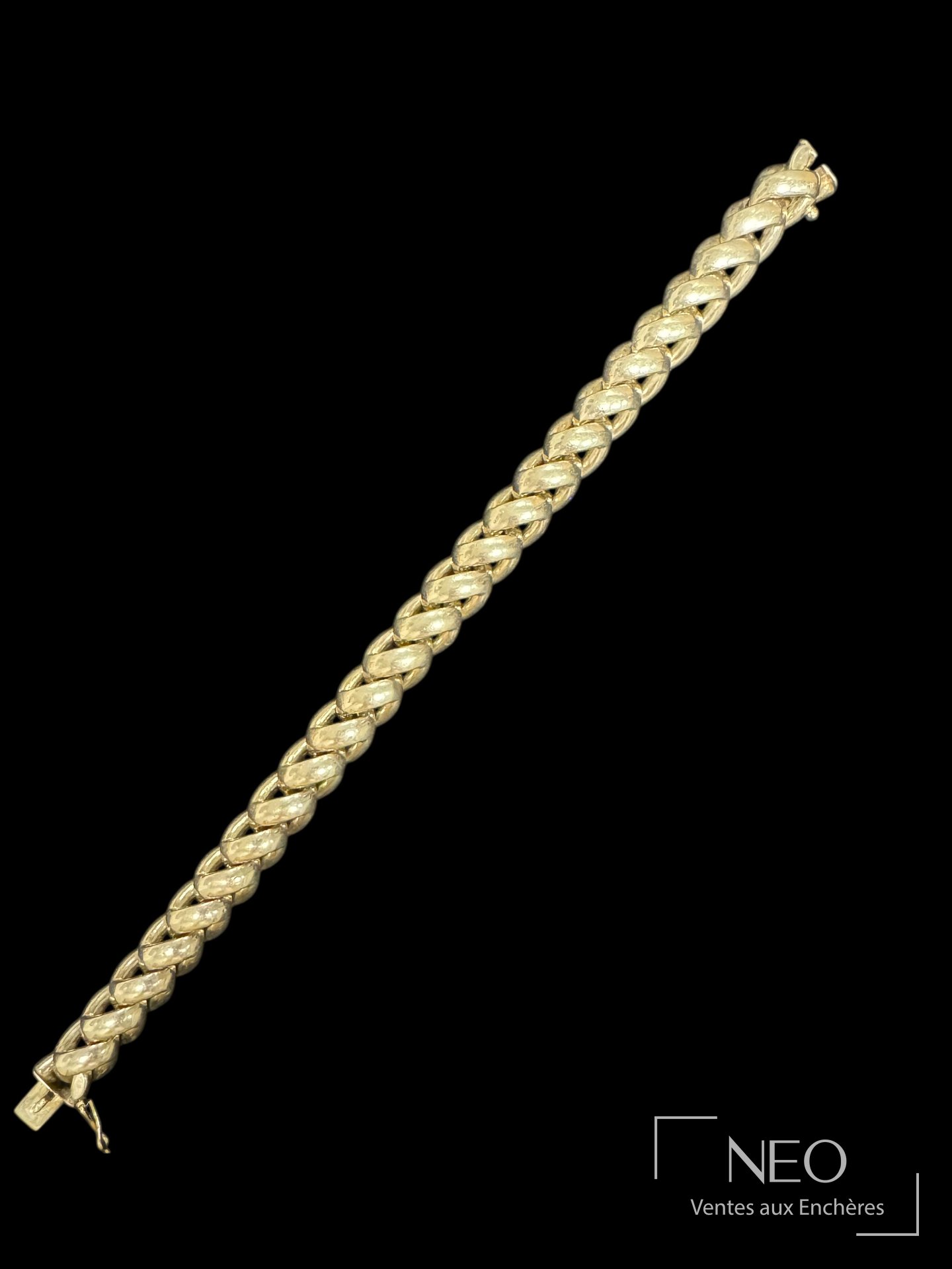 Bracelet torsade Hermès Paris en argent sur fond noir