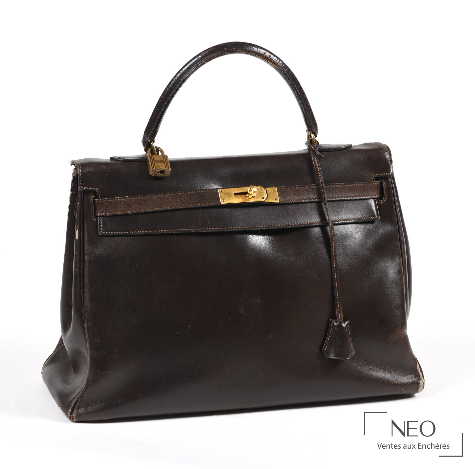 Sac Kelly Hermès Paris en veau Box marron avec clochette et cadenas en métal plaqué or