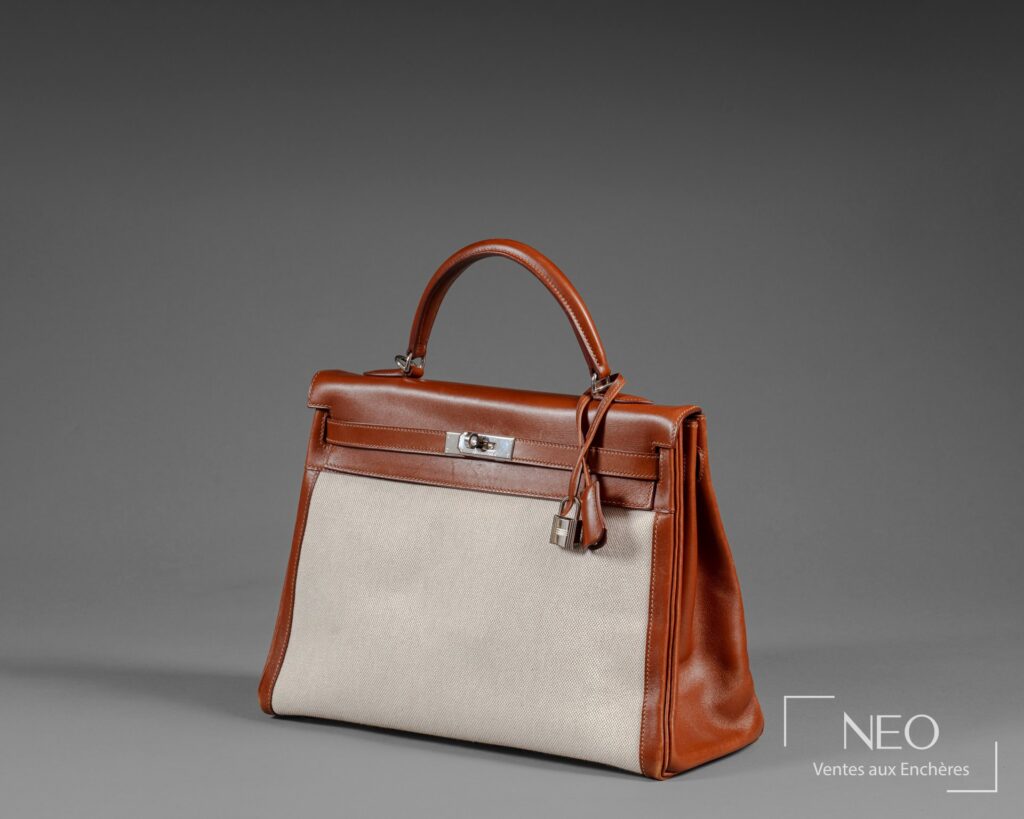 Sac Hermès Kelly retourné 35 cm en veau box noisette et toile H