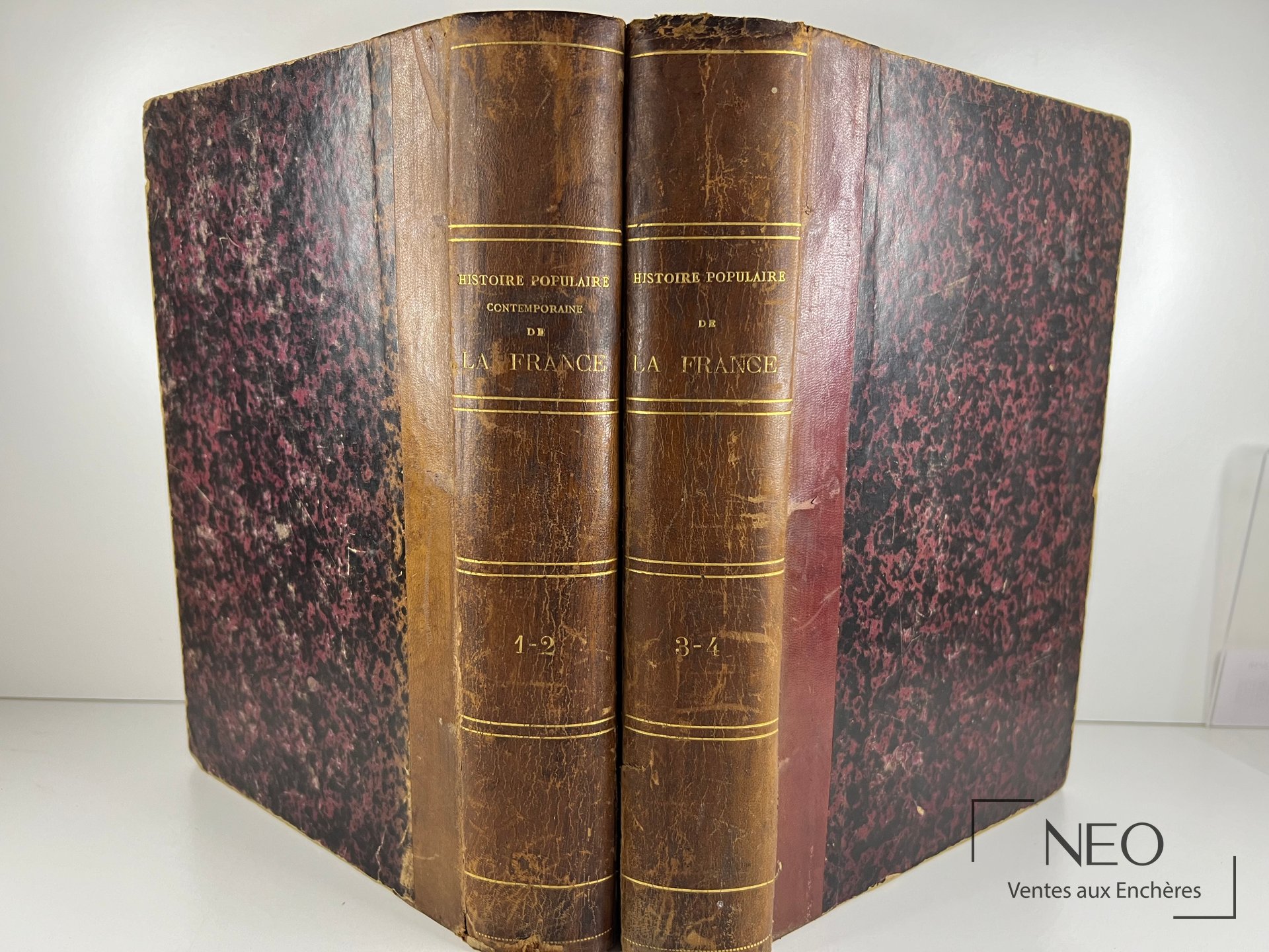 Deux volumes reliés en demi basane rouge