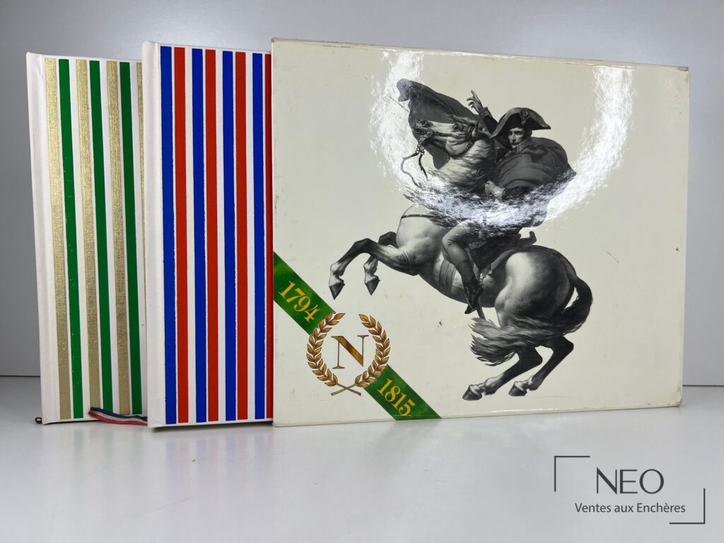 Coffret de deux volumes Jean Massin avec couvertures à bandes colorées et illustration équestre