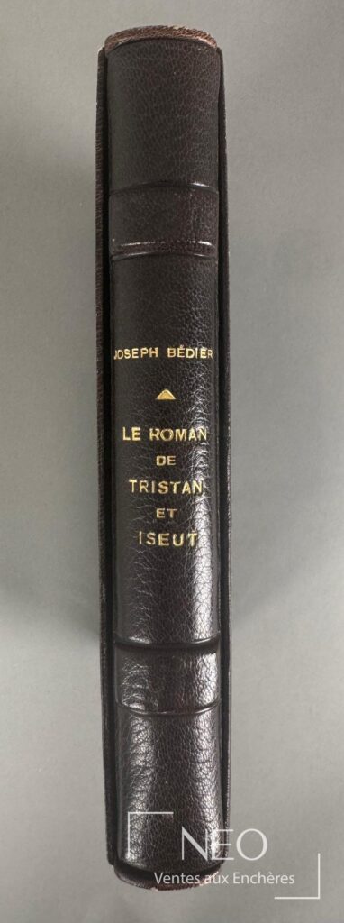 Dos d'un livre relié en plein veau noir avec titre doré Joseph Bédier