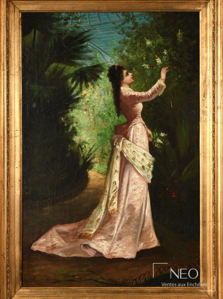 Portrait en pied d'une élégante en robe rose dans une serre tropicale