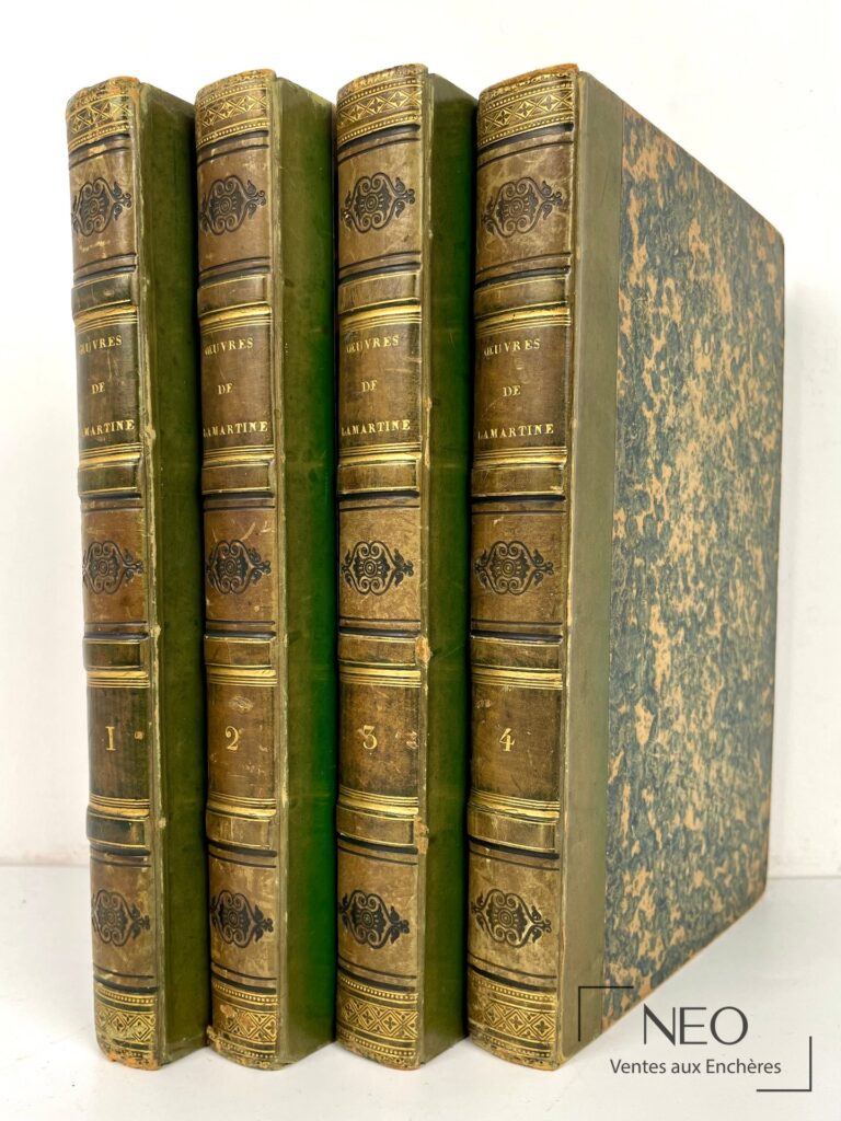 Quatre volumes reliés en demi basane verte