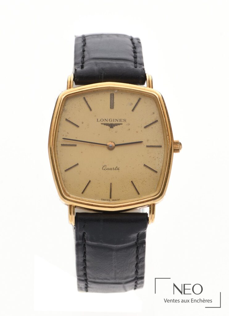 Montre-bracelet Longines en or jaune avec cadran doré et bracelet en cuir noir