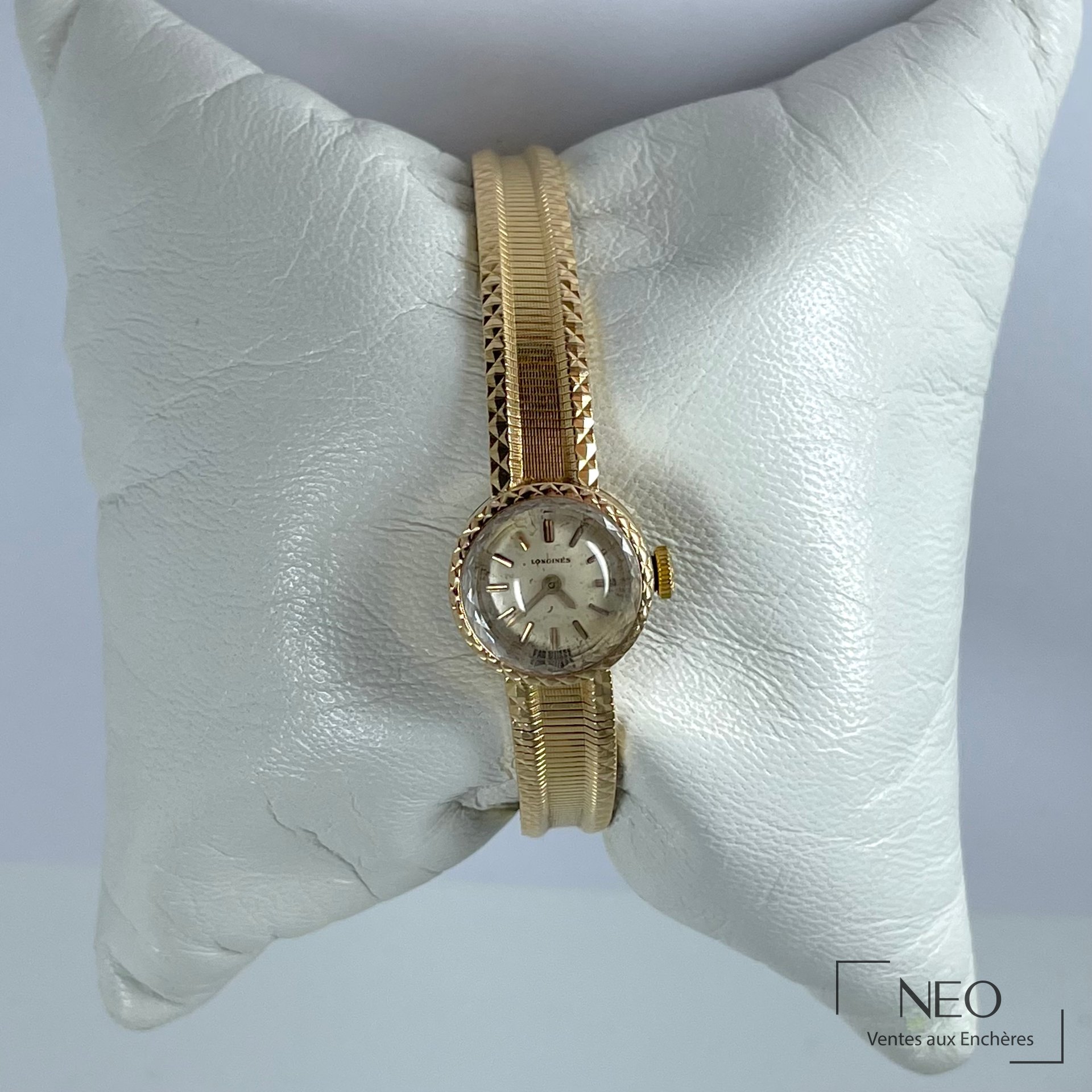 Longines montre de dame en or jaune 18 carats, cadran champagne