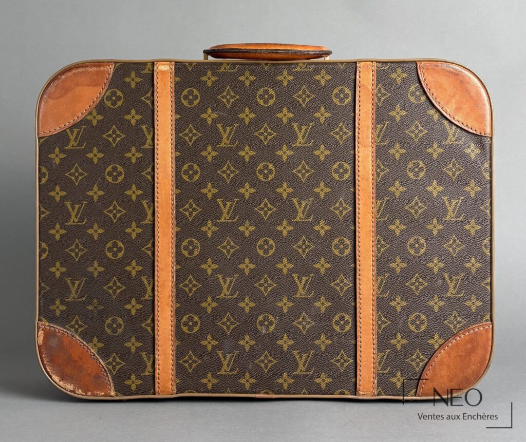 Petite valise Louis Vuitton en toile Monogram avec renforts en cuir patiné
