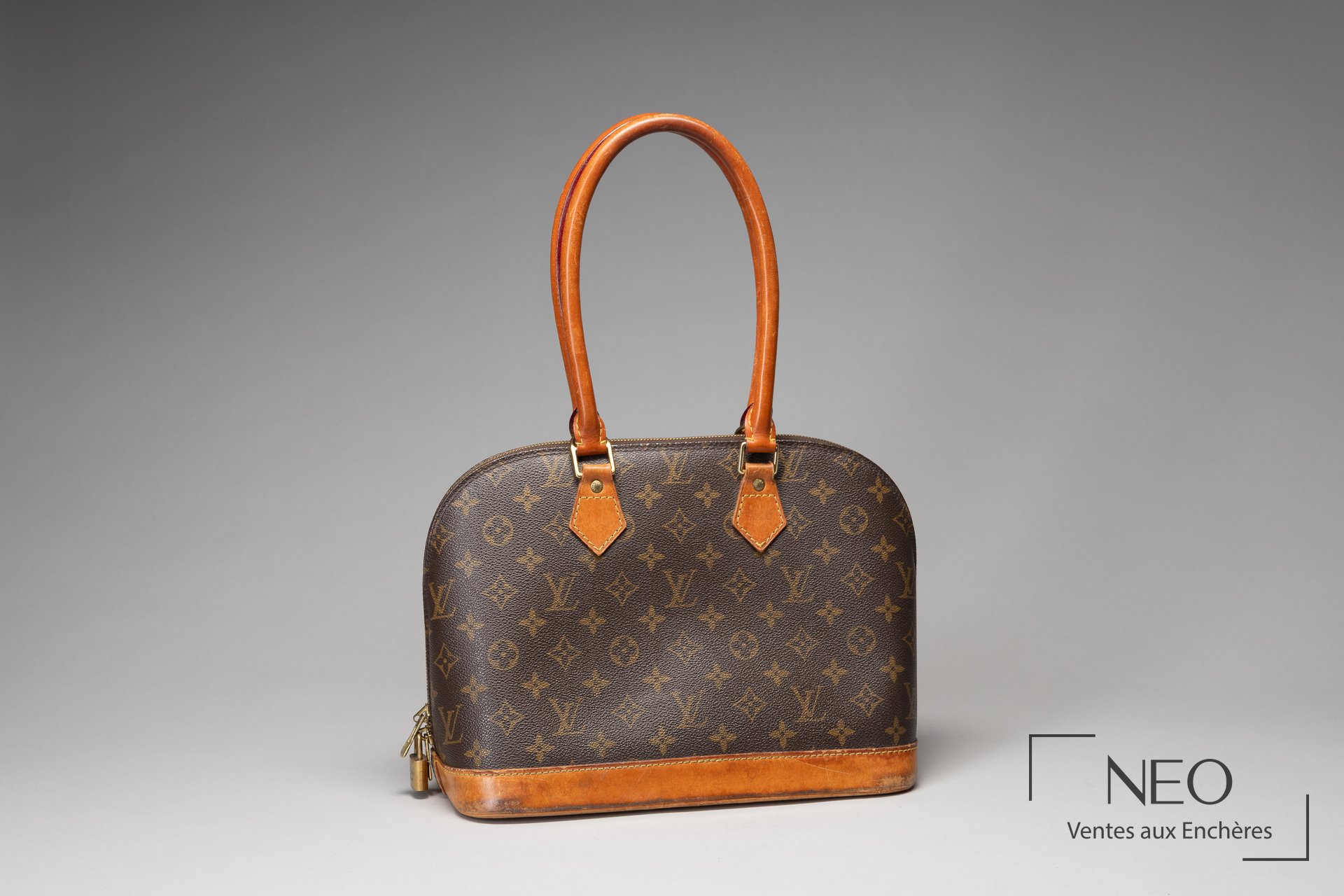 Louis Vuitton Sac Alma en toile monogram et cuir naturel