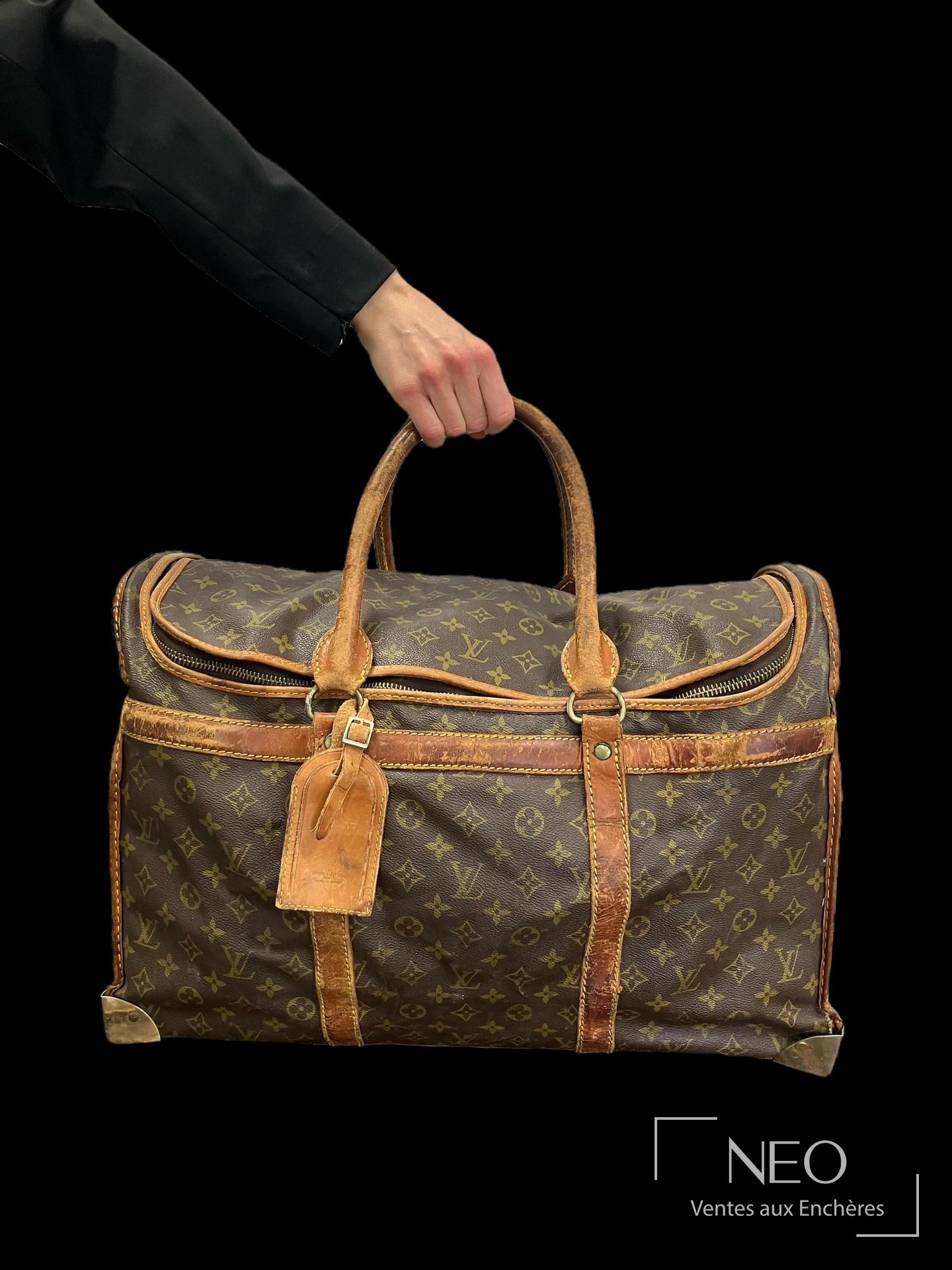 Louis Vuitton sac de voyage en toile monogrammée et cuir