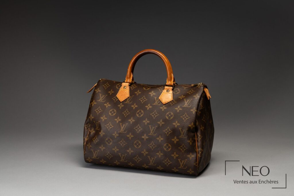 Sac Louis Vuitton Speedy 30 cm en toile monogramme avec anses en cuir naturel