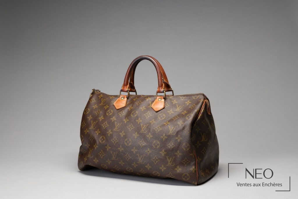 Sac Louis Vuitton Speedy 35 en toile monogrammée et cuir naturel