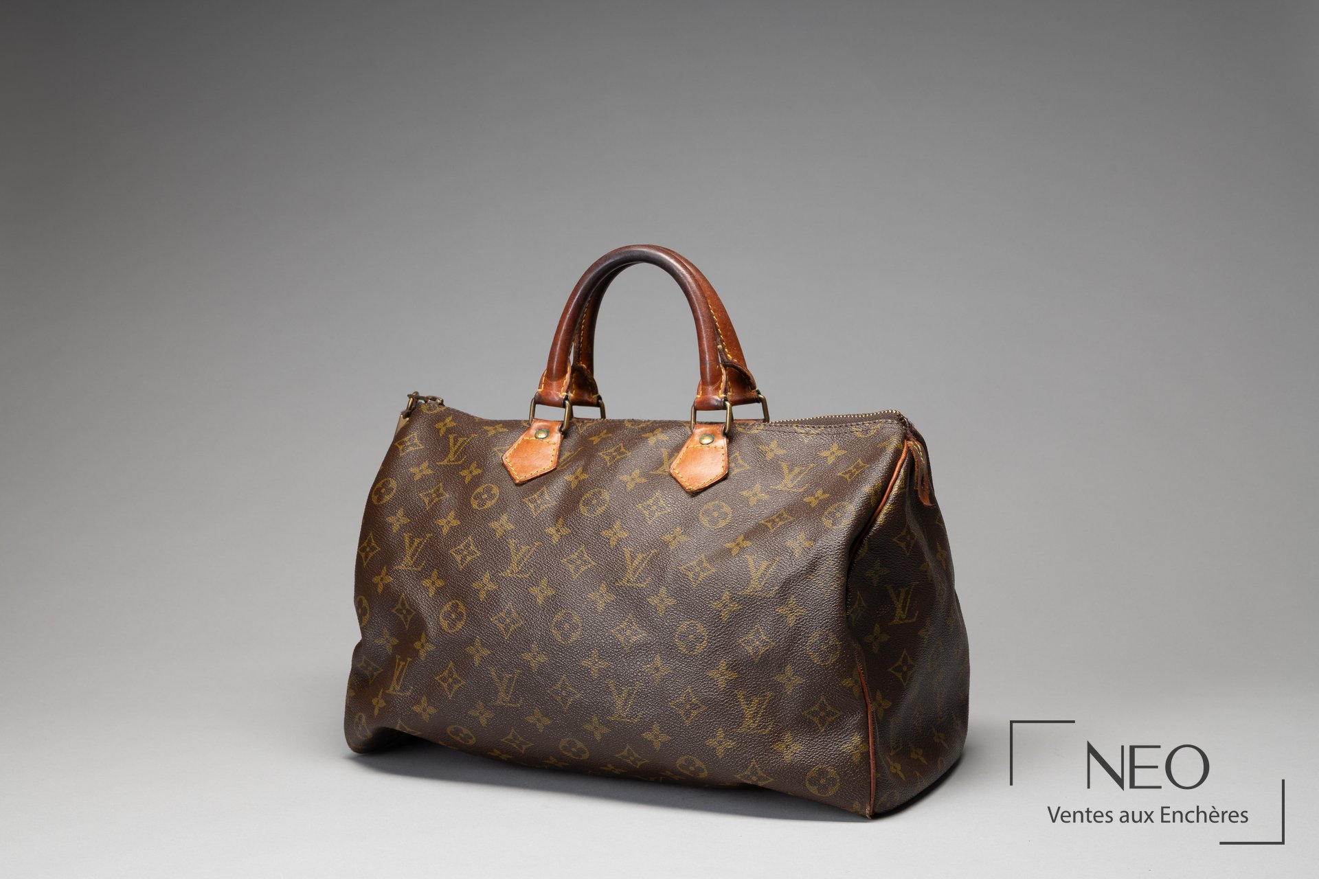 Sac Louis Vuitton Speedy 35 en toile monogrammée et cuir naturel