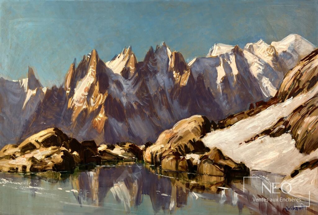 Paysage de montagne enneigée au-dessus d’un lac