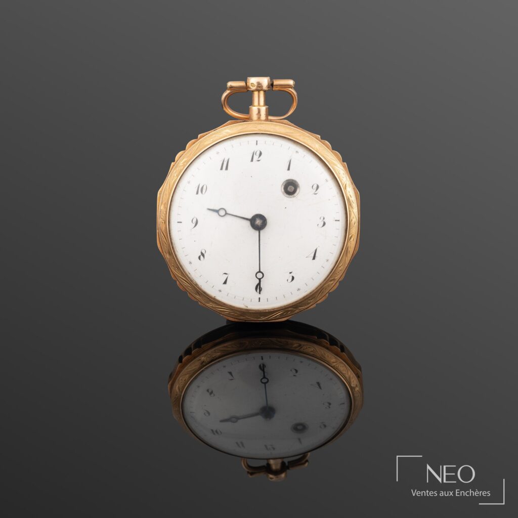 Montre à gousset en or jaune avec cadran émaillé blanc et chiffres arabes