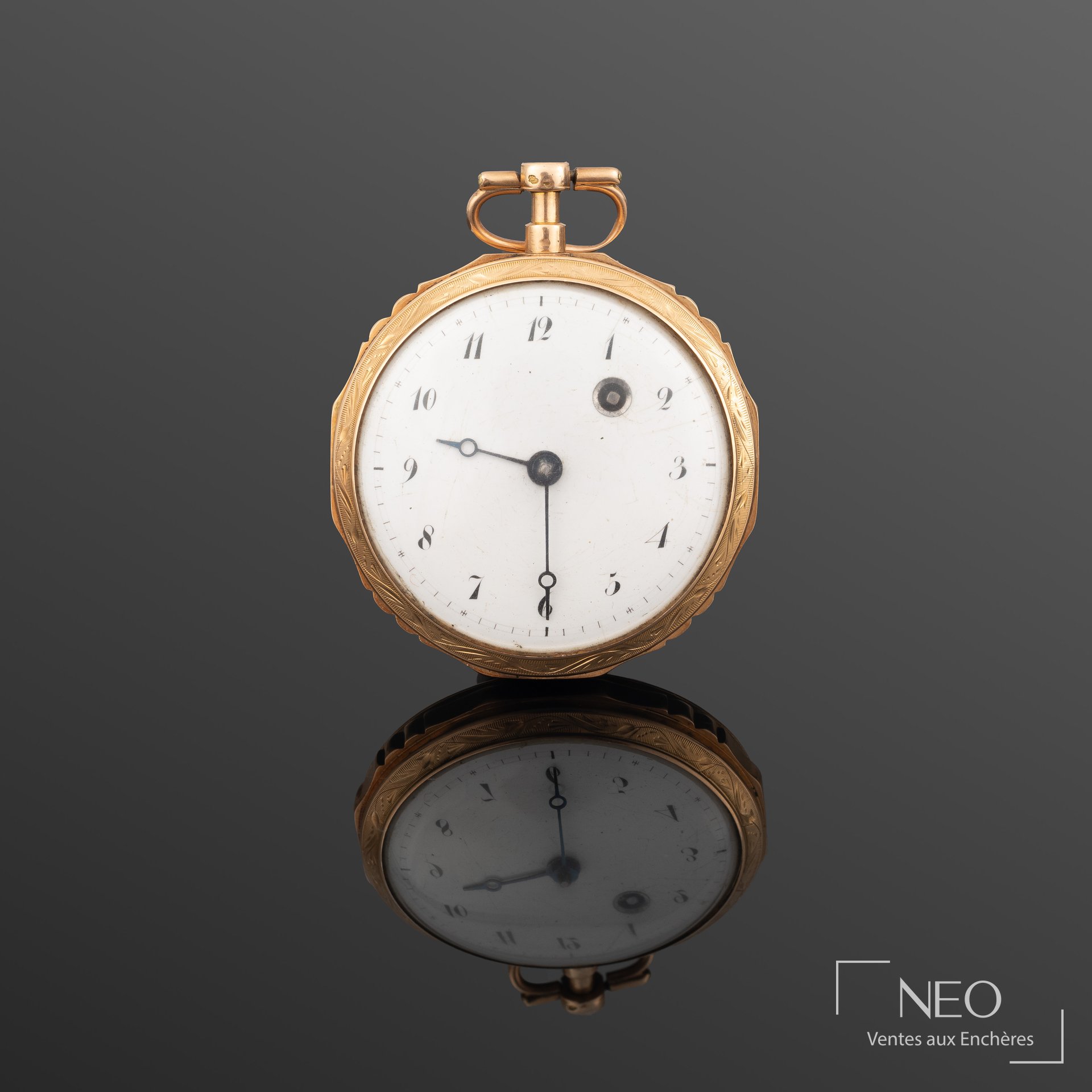 Montre à gousset en or jaune avec cadran émaillé blanc et chiffres arabes