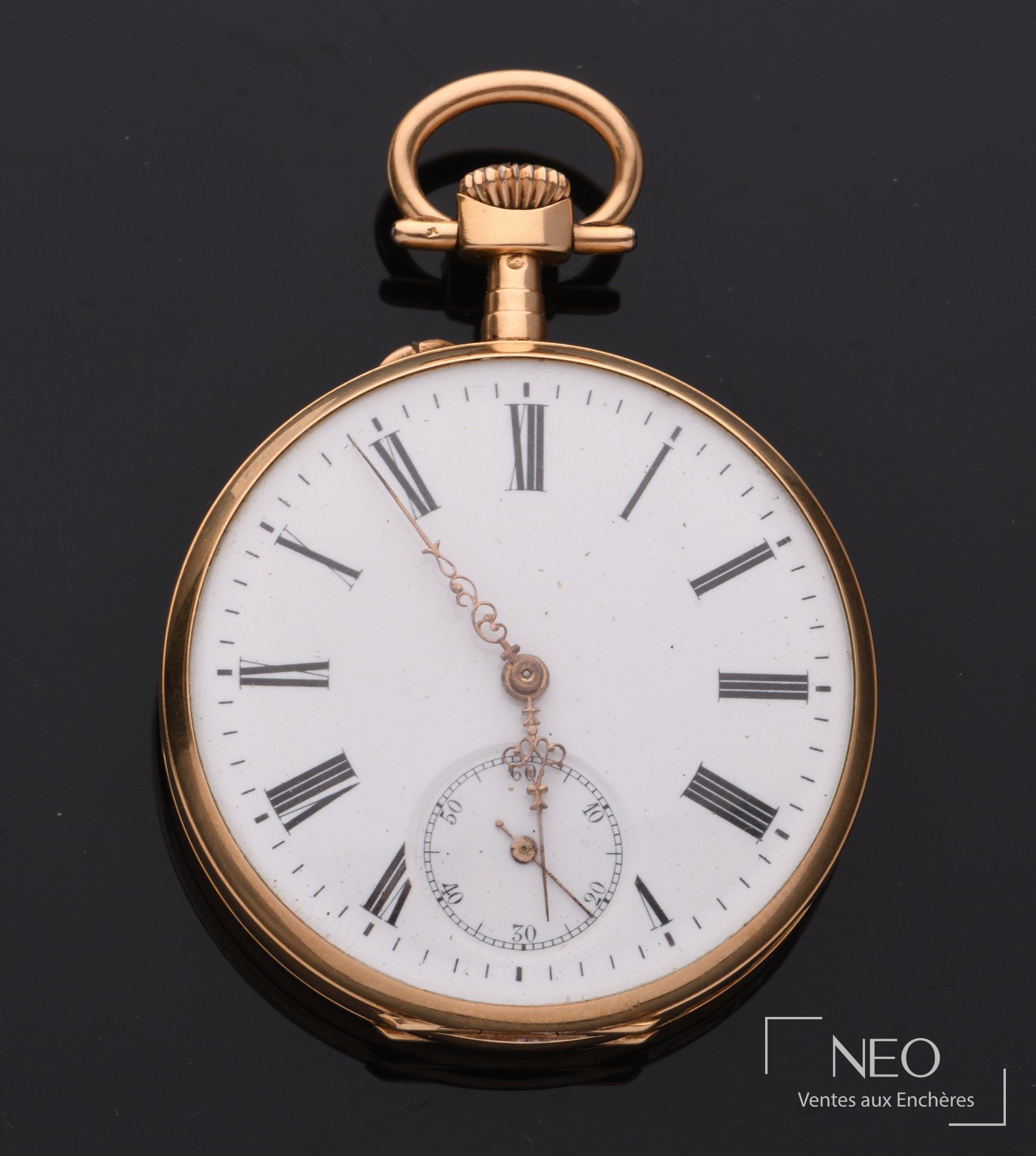 Montre à gousset en or jaune avec cadran émaillé blanc et chiffres romains