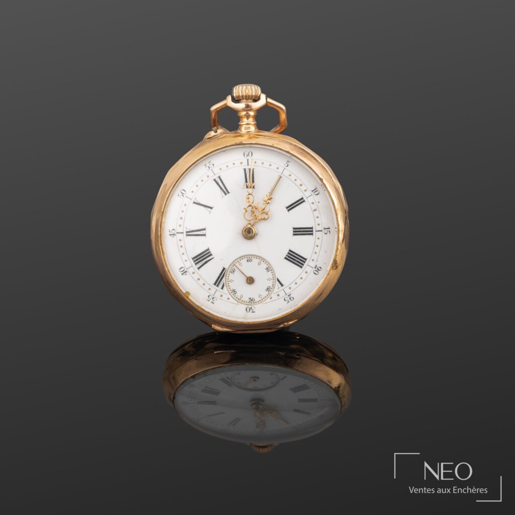 Montre à gousset en or jaune avec cadran émaillé blanc et chiffres romains