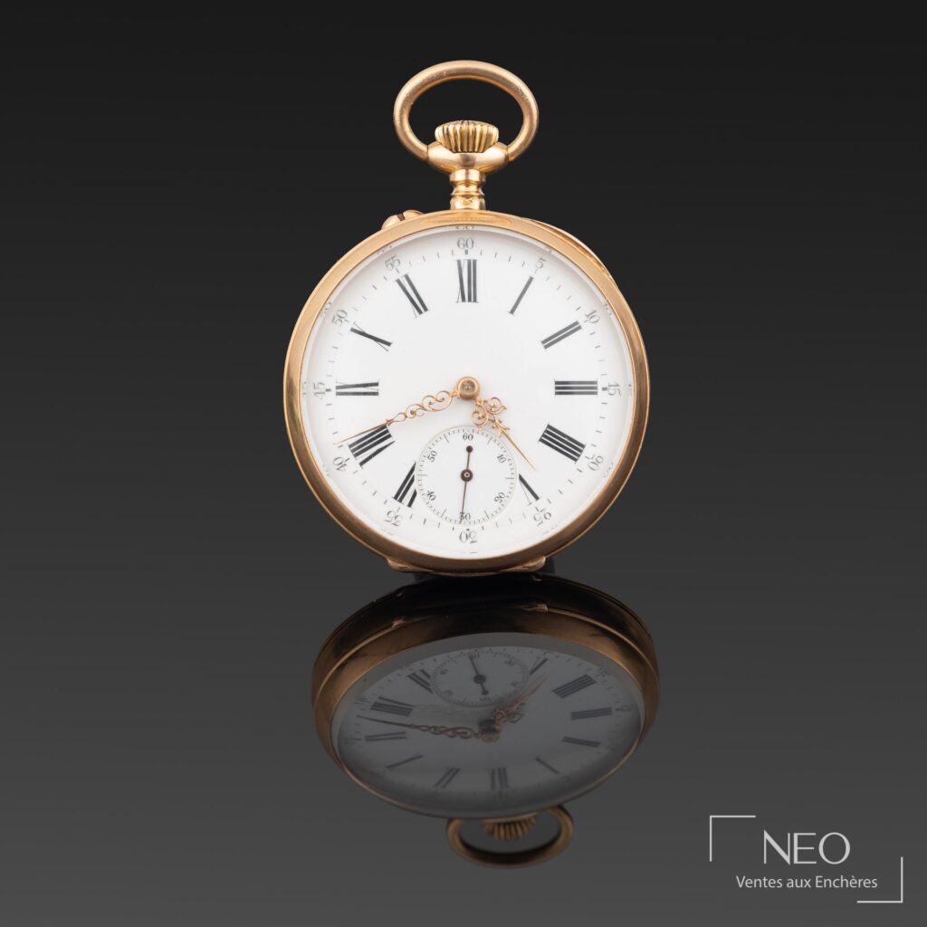 Montre à gousset en or jaune avec cadran émaillé blanc et petite seconde à 6 h