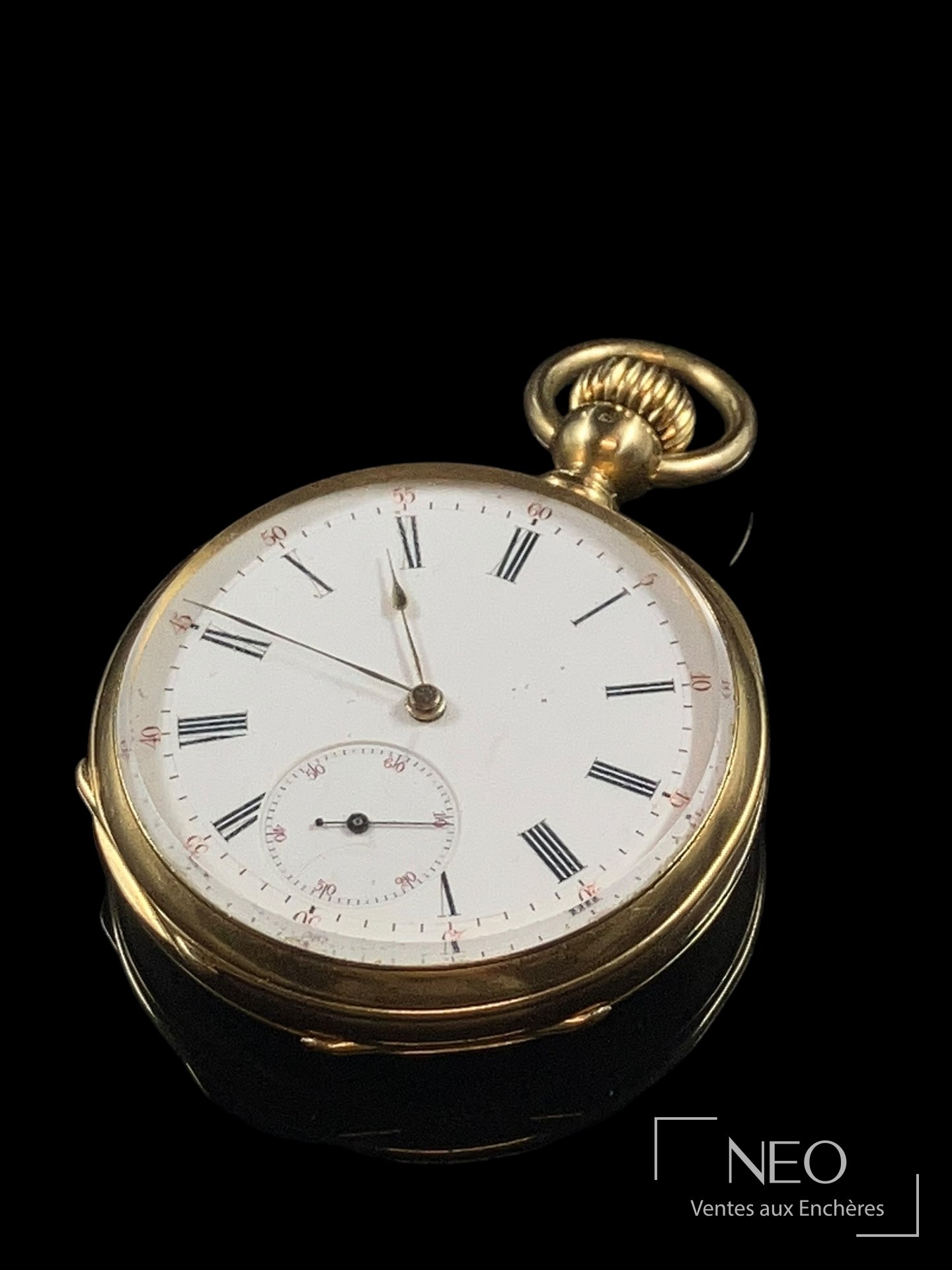 Montre à gousset en or jaune avec cadran émaillé blanc et chiffres romains