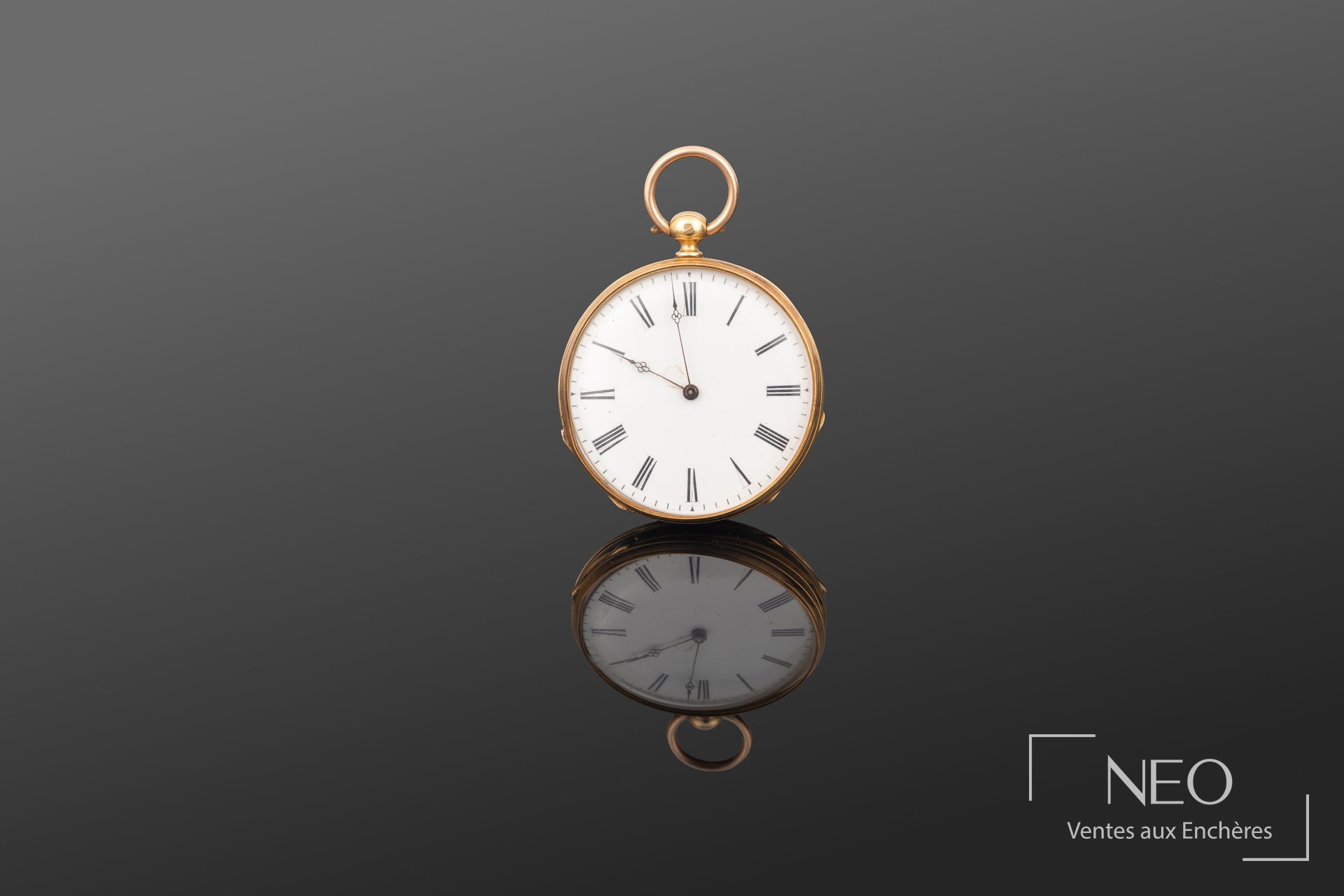 Montre à gousset en or jaune avec cadran émaillé blanc à chiffres romains