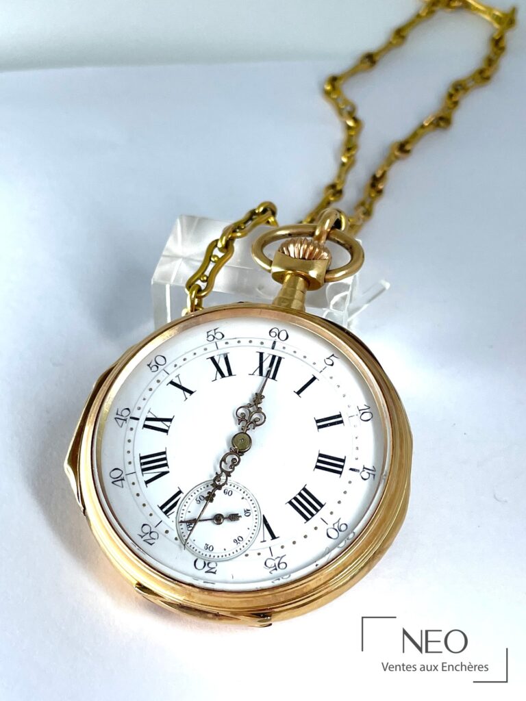 Montre à gousset en or jaune avec cadran émaillé à chiffres romains et arabes