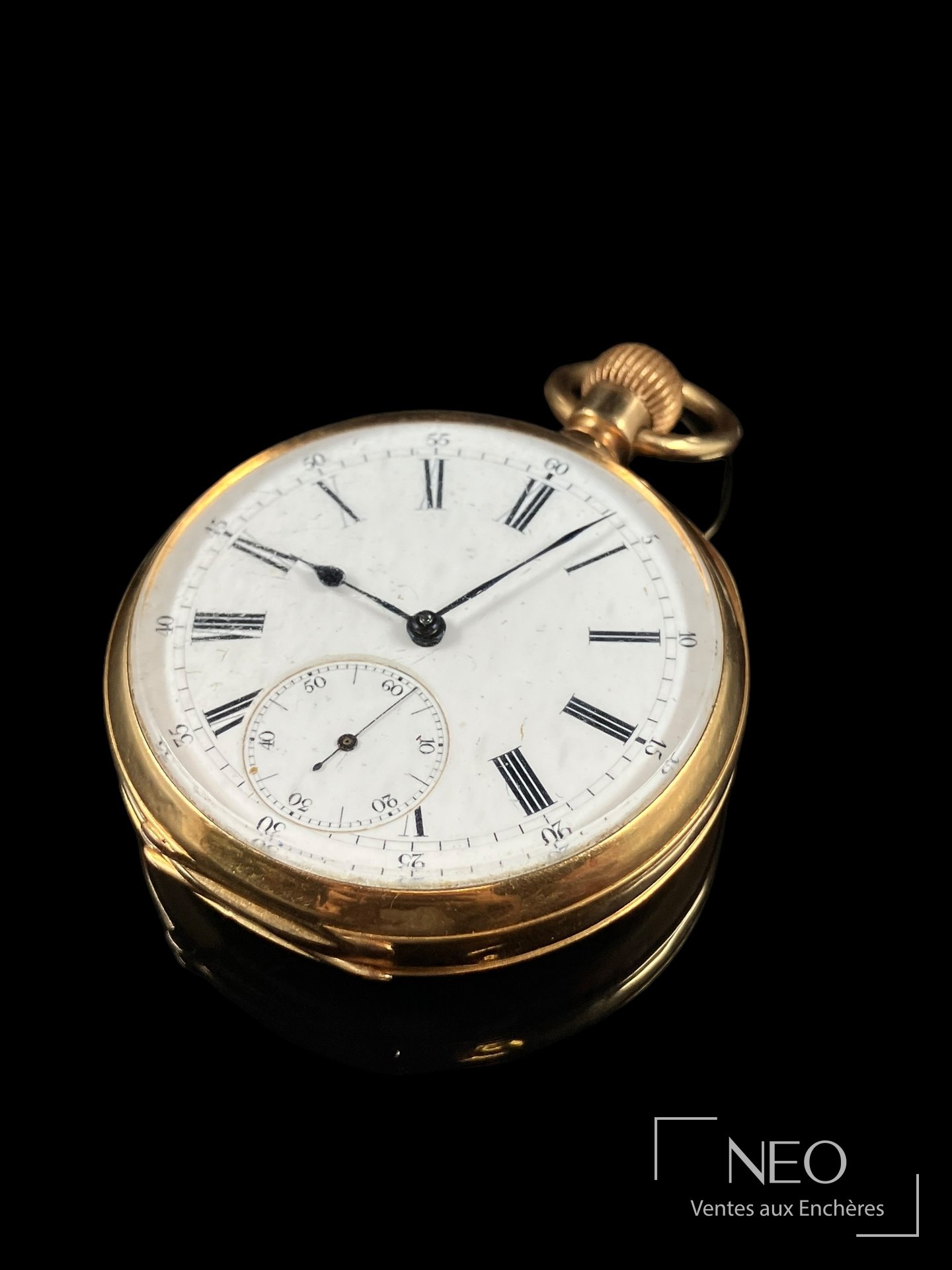Montre à gousset en or jaune avec cadran émaillé blanc et chiffres romains