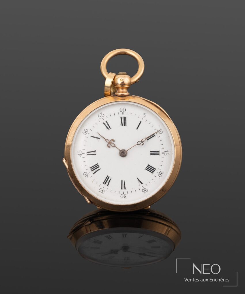 Montre à gousset en or jaune avec cadran émaillé blanc et chiffres romains