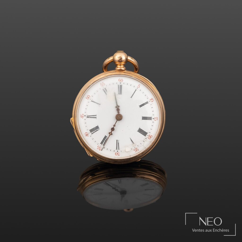 Montre à gousset en or jaune avec cadran émaillé blanc et chiffres romains