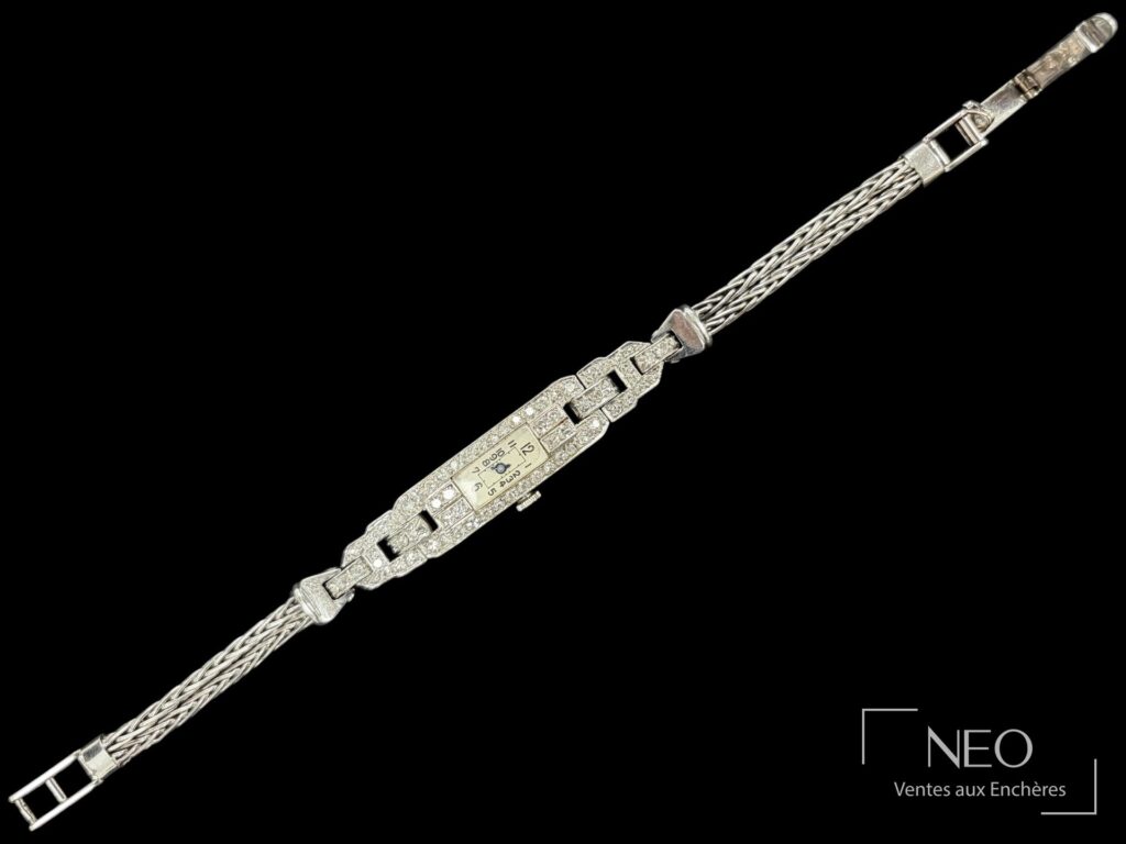 Montre bracelet cocktail en or gris et platine