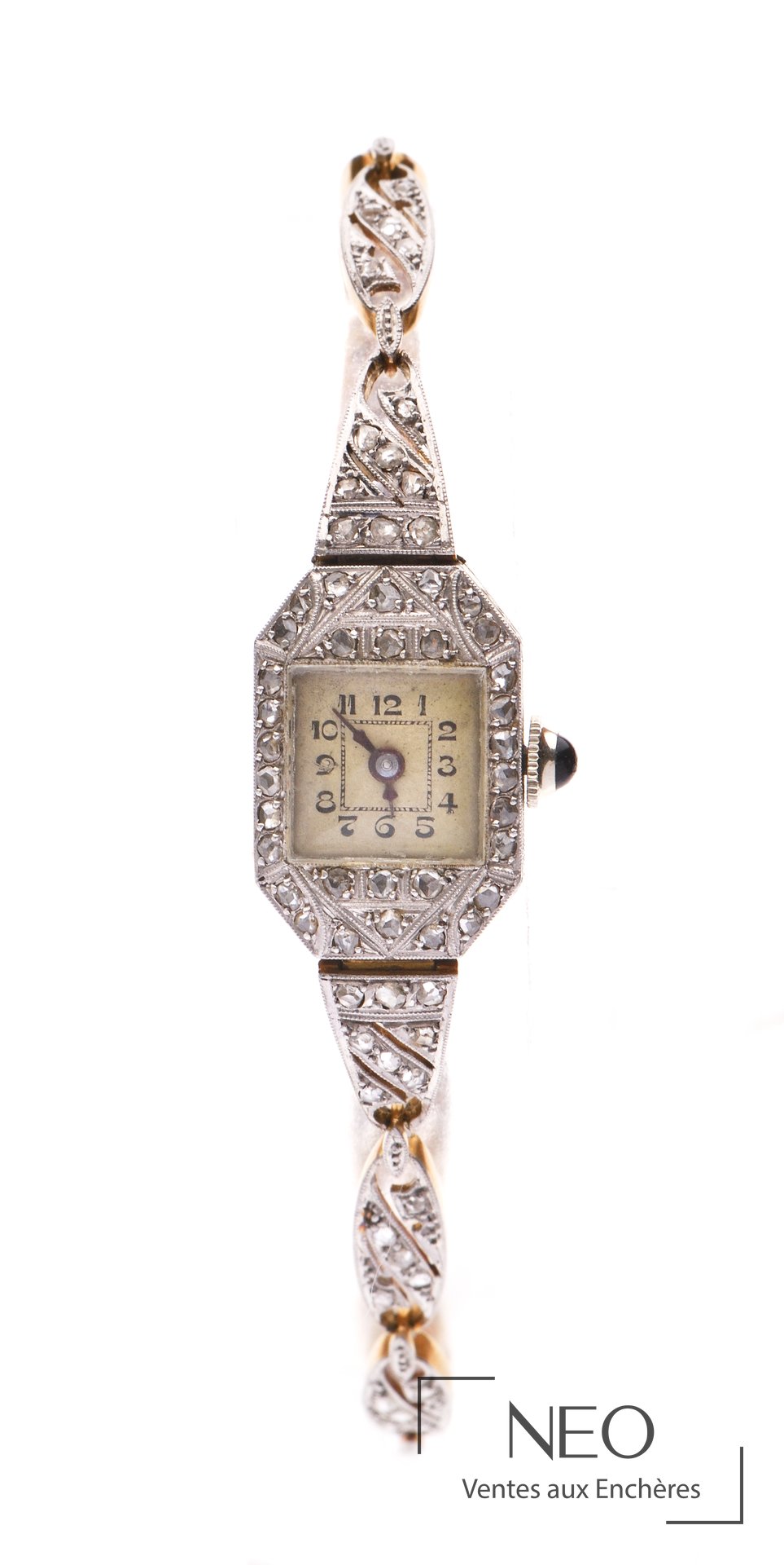 Montre-bracelet de dame en or jaune avec boîtier rectangulaire et bracelet ornementé