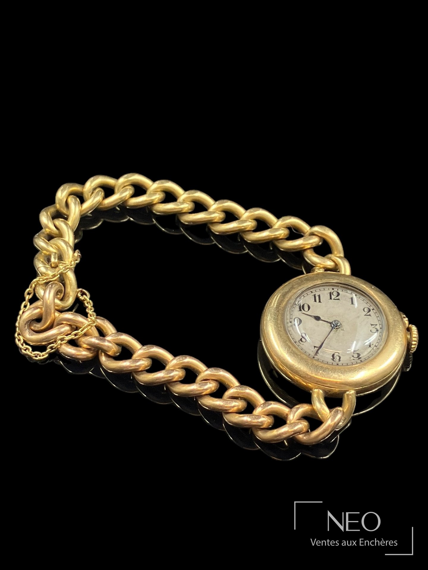 Montre bracelet en or jaune avec large bracelet à mailles