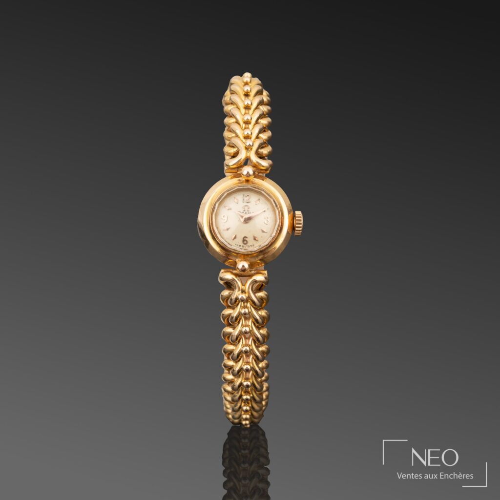 Montre bracelet OMEGA en or jaune 18K
