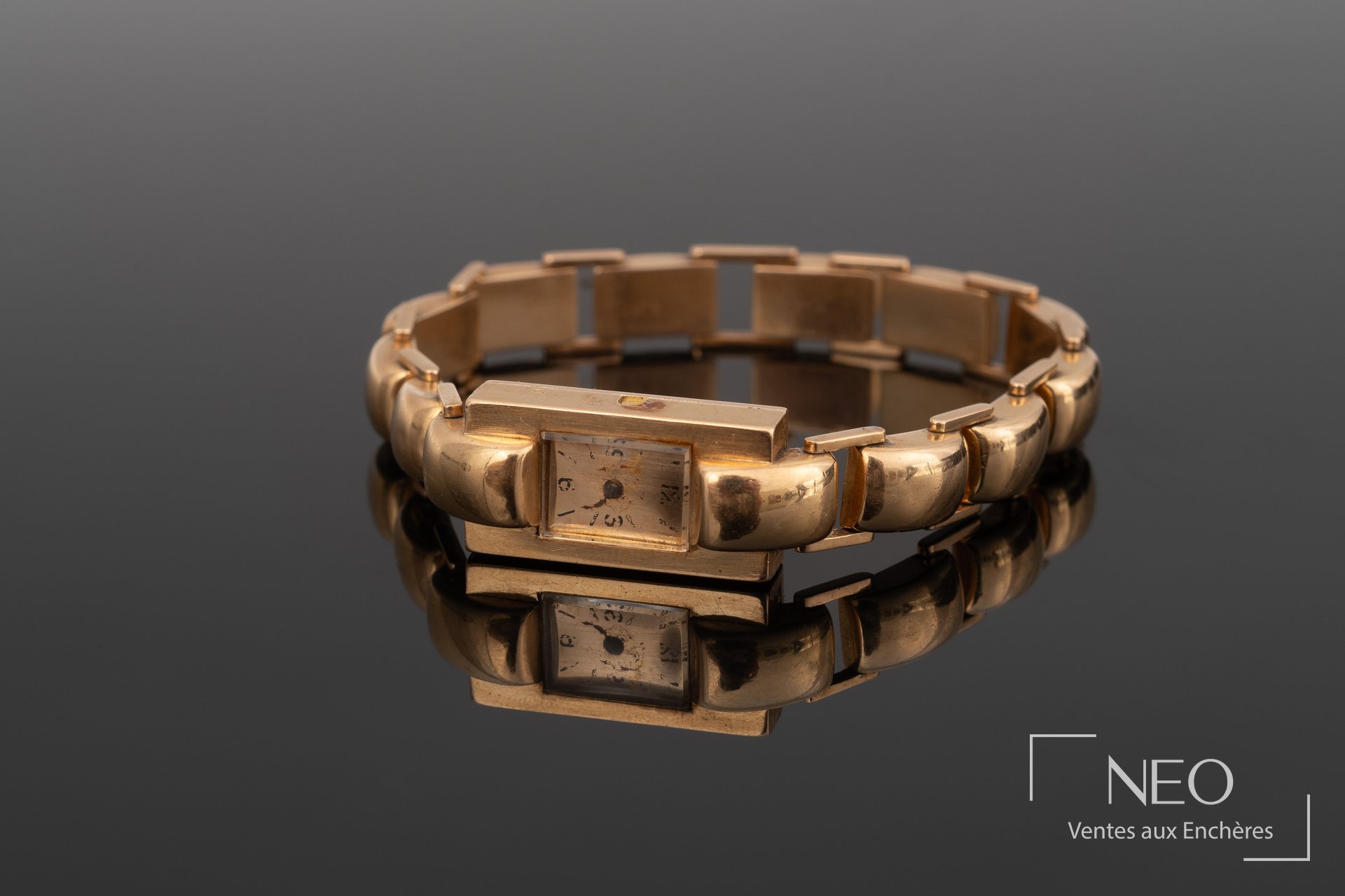 Montre bracelet rectangulaire en or jaune